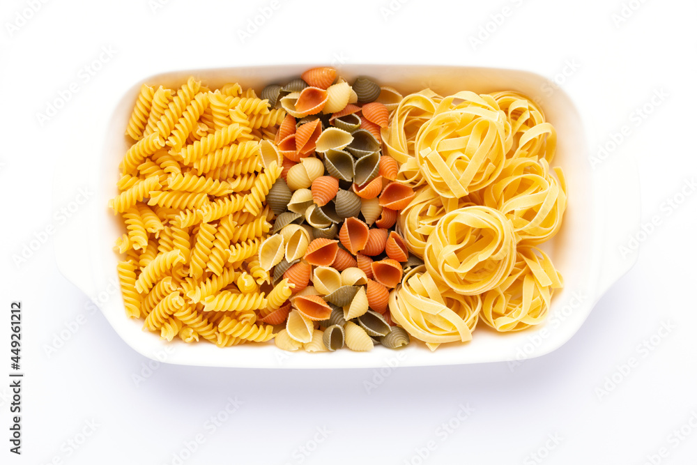 Pasta collection food in plate isolated on white background. Raw pasta Pasta collection food in plate isolated on white background. Raw pasta