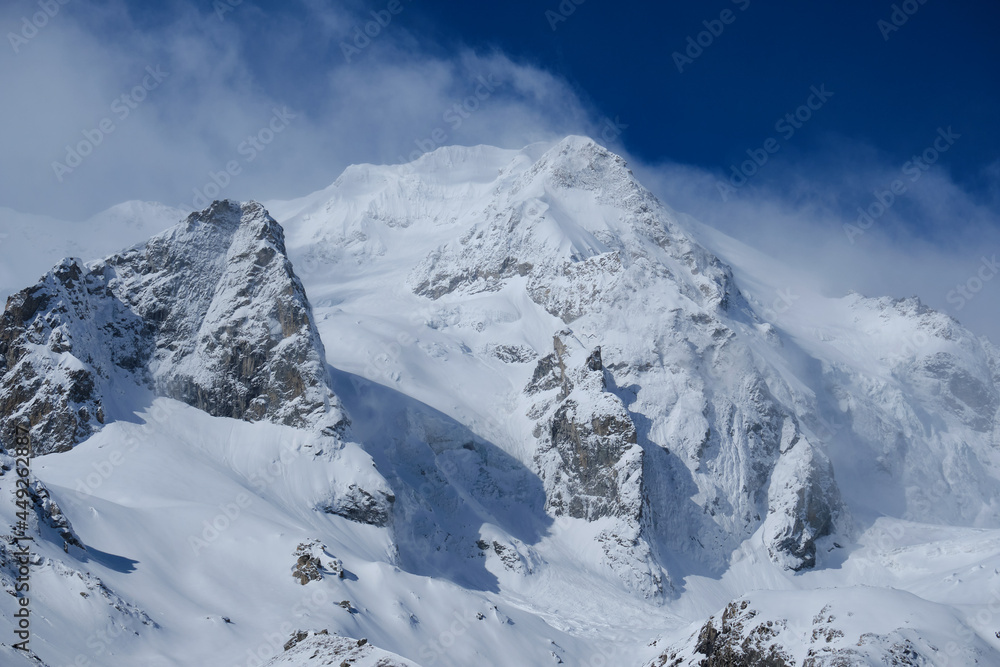 Snowy peak of Chegettau-chana mountain. Main Caucasian ridge, Adyr-su gorge.