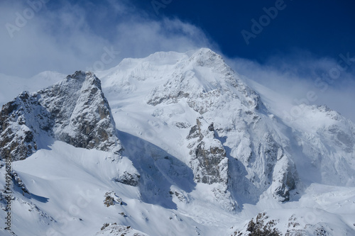 Snowy peak of Chegettau-chana mountain. Main Caucasian ridge, Adyr-su gorge.