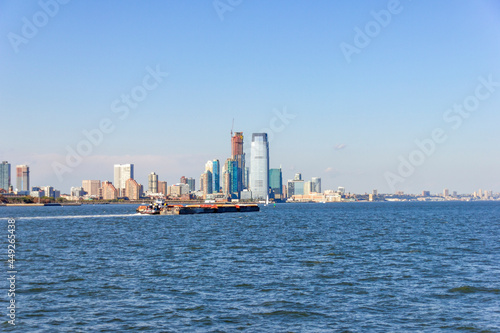 A boat shipping cargo between New York and New Jersey, USA