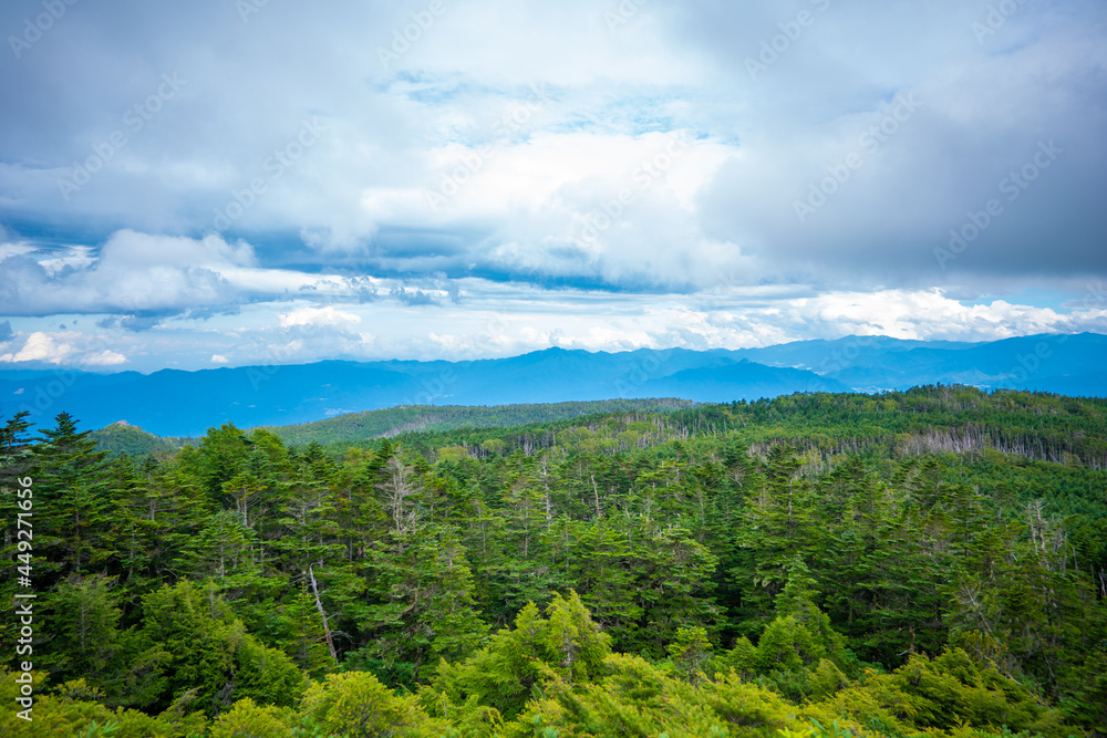 Fototapeta premium 長野県南佐久郡の八ヶ岳のニュウの登山動の風景 Nyu, Yatsugatake, Minamisaku-gun, Nagano Prefecture, Japan.