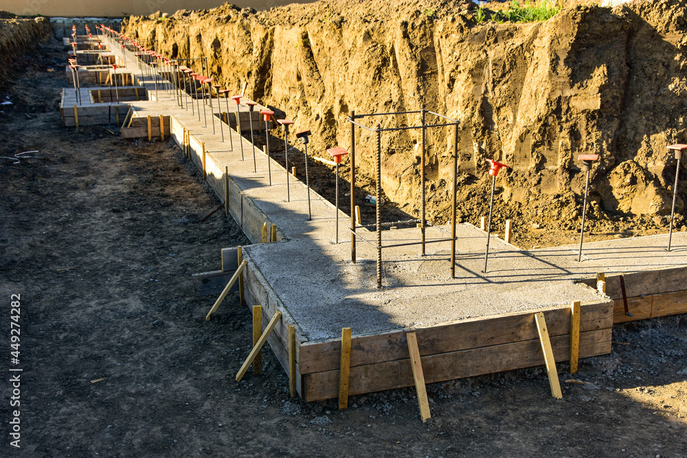 Footing Form Rods Wood forms, new concrete and re rod for footings for new commercial ...