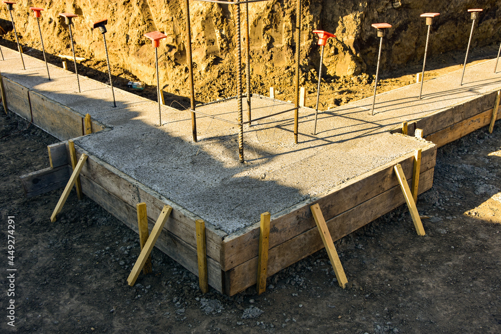 Footing Form Rods Wood forms, new concrete and re rod for footings for new commercial ...