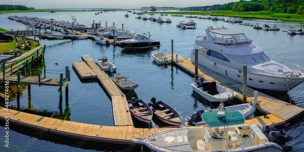 Aerial view of the marina with moored boats, ships, yachts, and dinghies