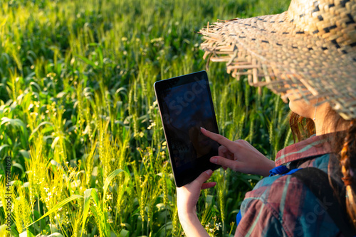 Obraz na plátně young farmer touching the tablet
