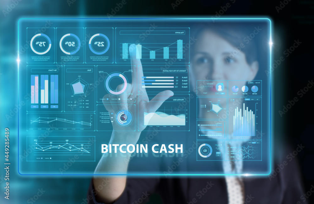 Obraz premium Business, Technology, Internet and network concept. Young businessman working on a virtual screen of the future and sees the inscription: Bitcoin cash