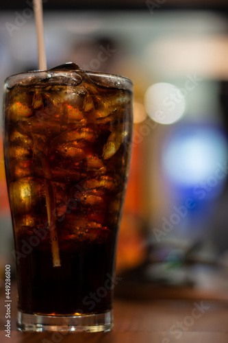 glass of cola with ice