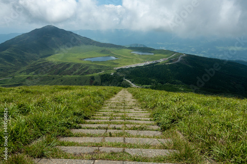 熊本県阿蘇市の烏帽子岳、阿蘇山を登山をしている風景 Scenery of climbing Mount Eboshi-dake and Mount Aso in Aso City, Kumamoto Prefecture. 