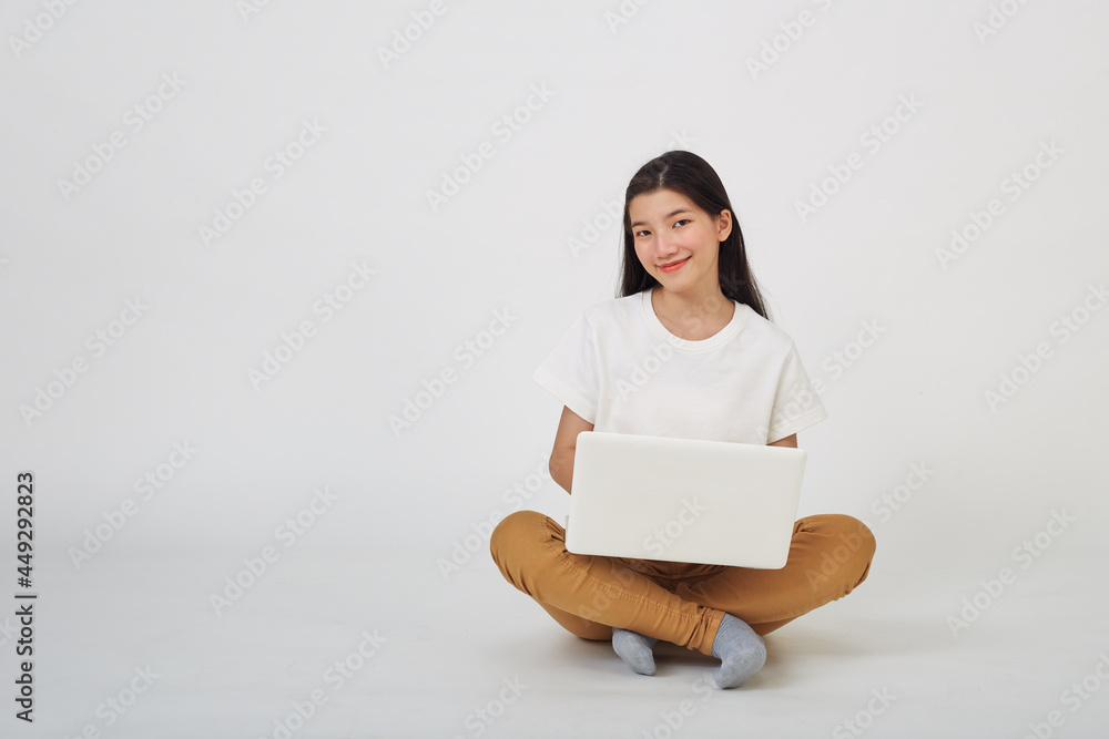 woman attractive sitting on the floor using laptop woman attractive sitting on the floor using laptop