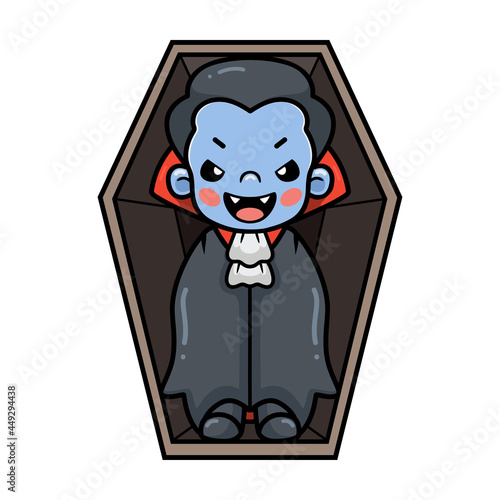 Cute little boy dracula cartoon inside coffin