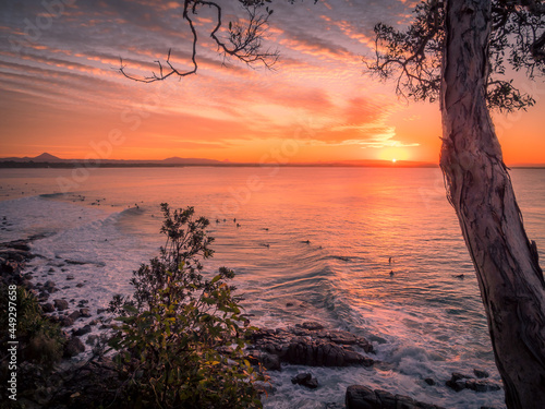 Noosa Sunset with Surfers on the Sea