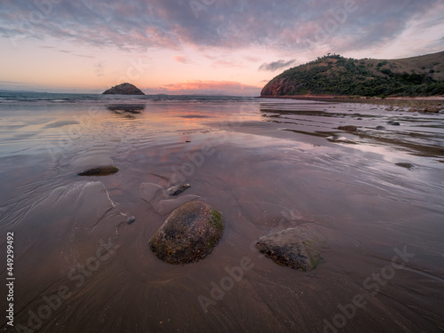 Seaside Evening with Rocks and Reflections