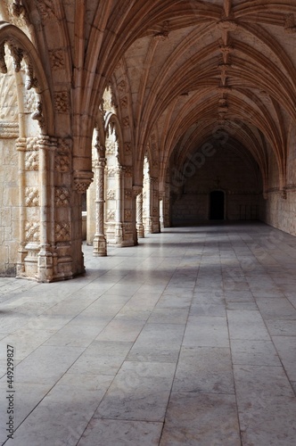 Monastery in Lisbon, Portugal. Corridor and Architecture of Jeronimos Monastery © yoosun