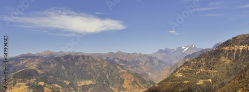 beautiful mountainscape and snowcapped peak, blue sky in the background in summertime, tawang in arunachal pradesh in india