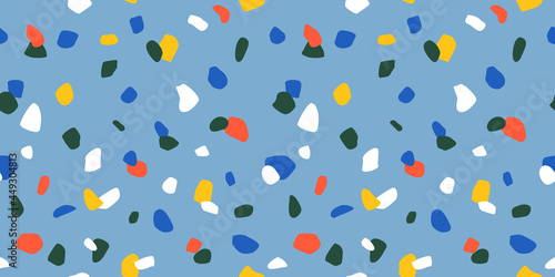 Terrazzo seamless pattern in bright primary colors with abstract mosaic stone shapes. Retro terrazo minimalist art background ideal for print, fashion or trendy design project.