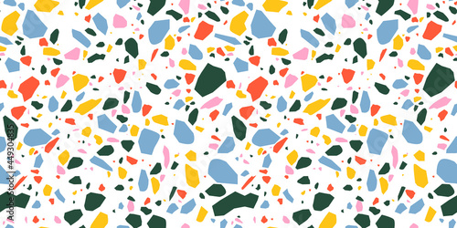 Terrazzo seamless pattern in bright primary colors with abstract mosaic stone shapes. Retro terrazo minimalist art background ideal for print, fashion or trendy design project.