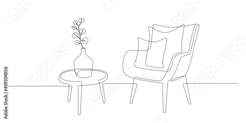 Continuous one line drawing of armchair and table with vase with plant. Scandinavian stylish furniture in simple Linear style. Doodle vector illustration photo