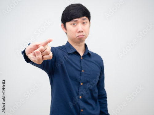 Asian man show finger for reconcile portrait white background photo
