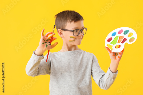 Cute little boy with paint ...