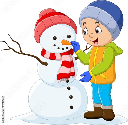 Cartoon little boy building a snowman