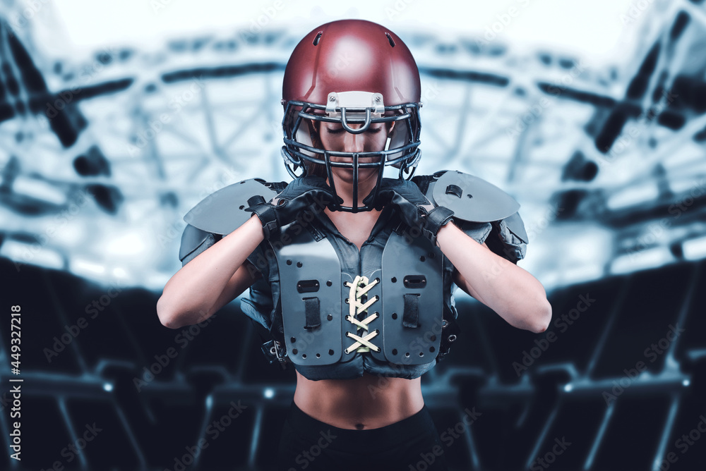 Female american football player in uniform, Stock image