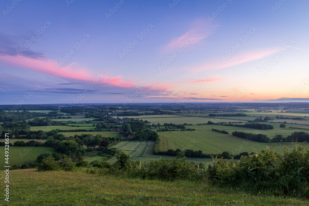 blue hour and a purple sky over the Kent countryside from the top of the Wye downs south east England - obrazy, fototapety, plakaty 