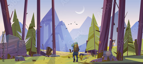 Traveler at forest with mountains view at morning
