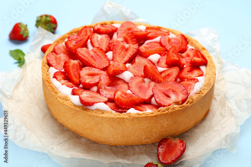 Tasty strawberry pie on color background