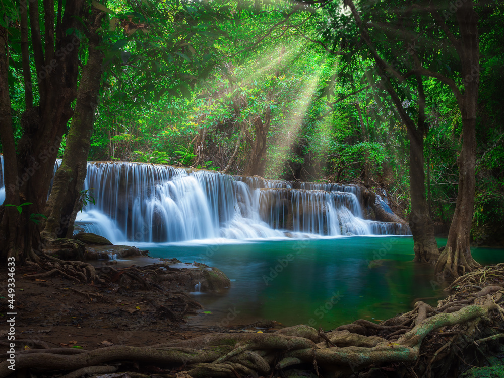 Fototapeta premium Huay Mae Khamin Waterfall is located in the Srinakarin Dam National Park. The waterfall flows from the upstream of the Khao Kala, which is a dry evergreen forest in the east of Srinakarin Dam National