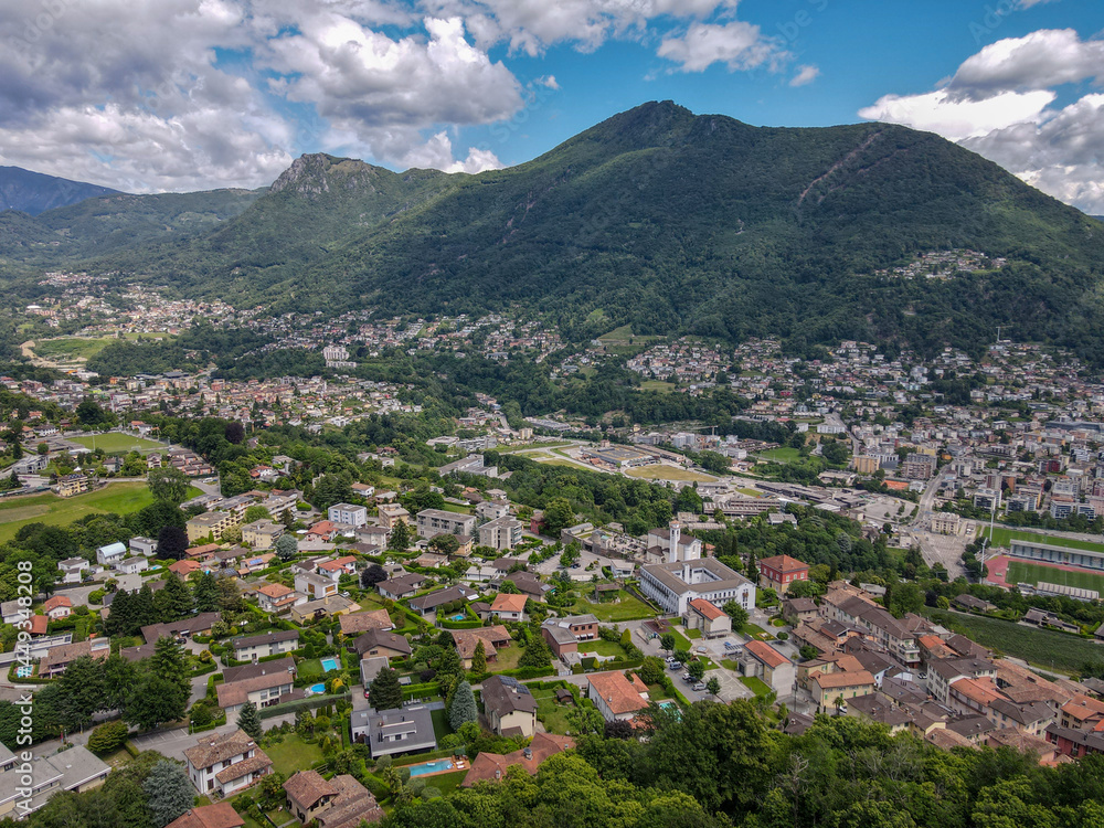 Drone view at Porza and Colla valley over Lugano on the italian part of Switzerland