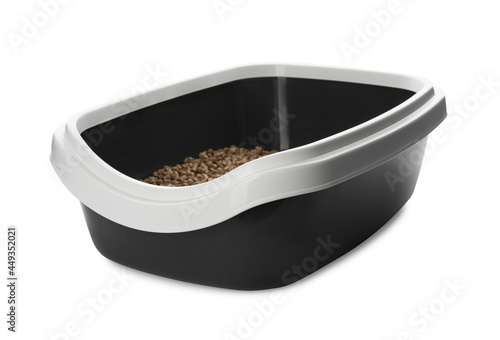 Black cat litter tray with filler isolated on white photo