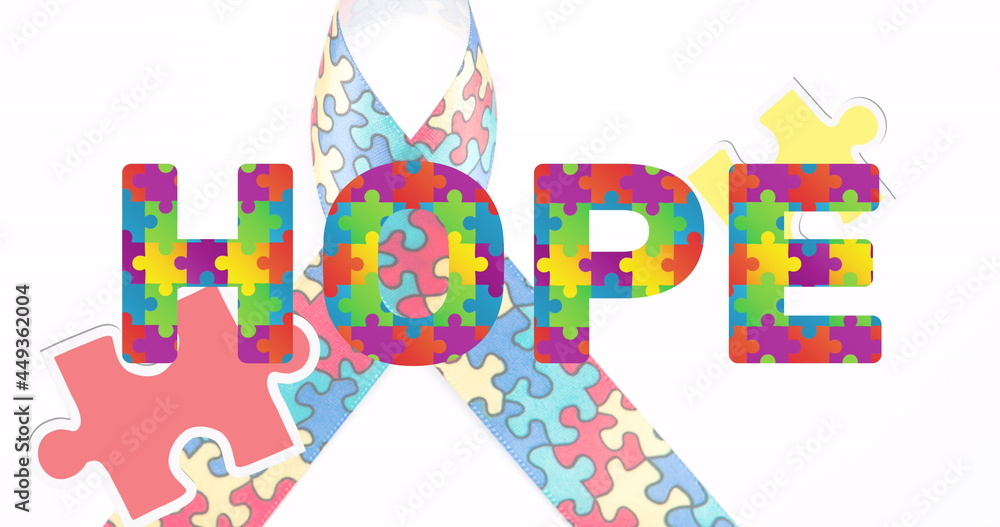 Image of hope text over ribbon formed with puzzles on white background