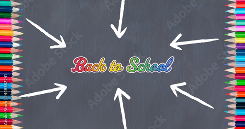 Multiple arrows over back to school text and colored pencils against grey background