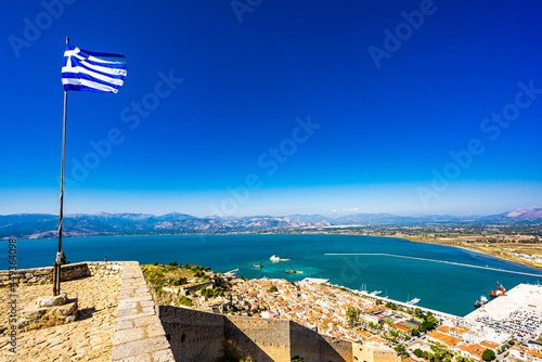 Greek Flag waving on Palamidi Fortress in Nafplion, Argolis - Greece