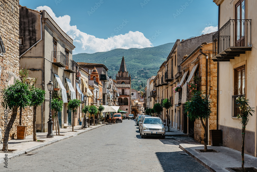 Castelbuono, Sicily. Narrow streets of small medieval village in Park of Madonie.It is known for panettone,typical Sicilian cake.Historical city center,colorful buildings with balconies,urban scene