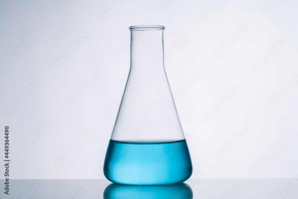 conical flask with blue liquid. conical flask with blue liquid.