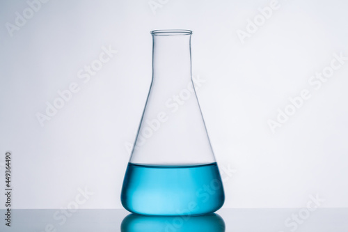 conical flask with blue liquid. photo
