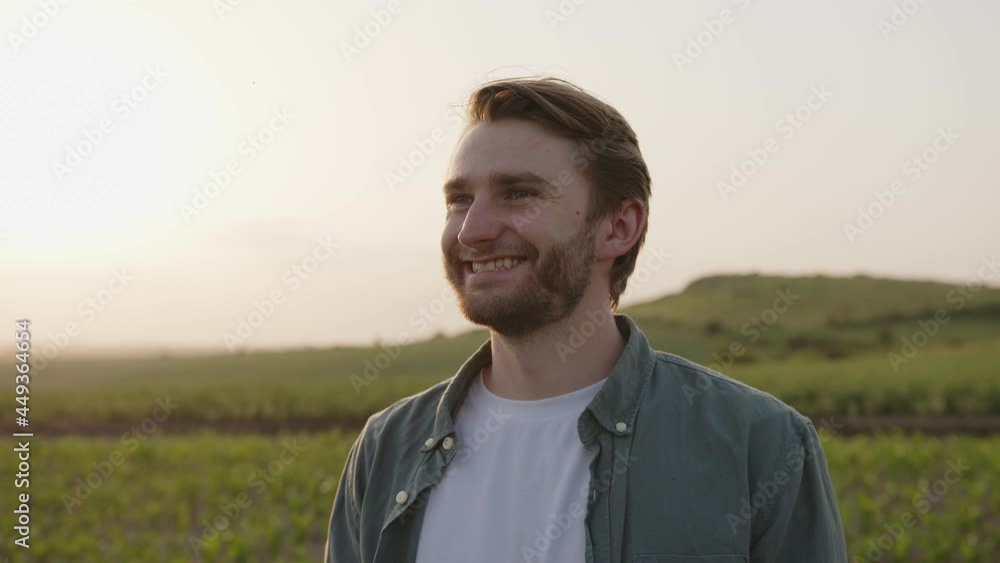 Close up view of a young farmer on a corn field Close up view of a young farmer on a corn field