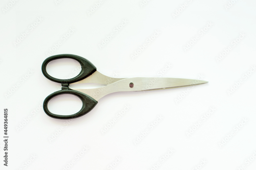Scissors isolated on a white studio background Scissors isolated on a white studio background
