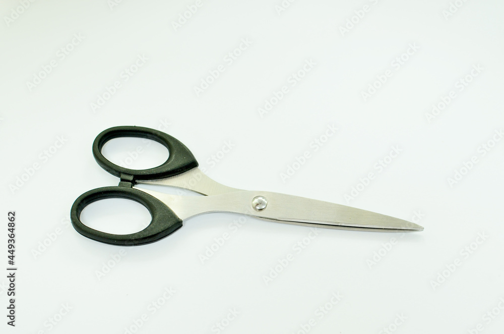 Scissors isolated on a white studio background Scissors isolated on a white studio background
