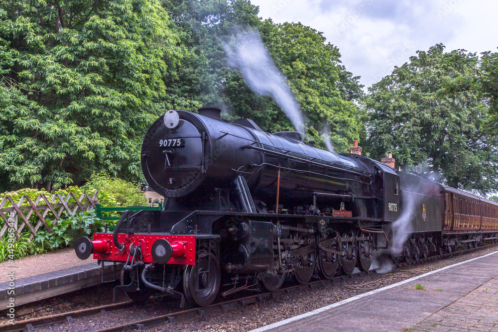 Obraz premium Poppy Line steam train at Holt station, taken on 9th July 2021.
