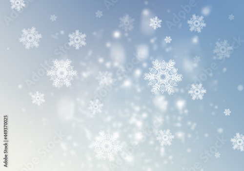 Winter background with abstract snowflakes.