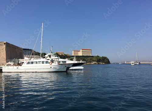 The entrance to the Old Port with the Pharo Palace in the background seen from the Vieux Port marina in the vicinity of Fort Saint Nicolas in Marseille, France.