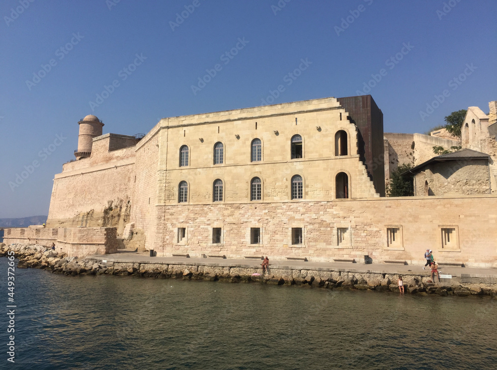 The Fort Saint Jean with the large round Tour du Fanal tower, one of the most visited monuments in Marseille. It is connected to the former port by a footbridge.