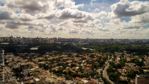 Aerial view of Sao Paulo city. Prevervetion area with trees and green area of Ibirapuera park in Sao Paulo city, Brazil © Pedro