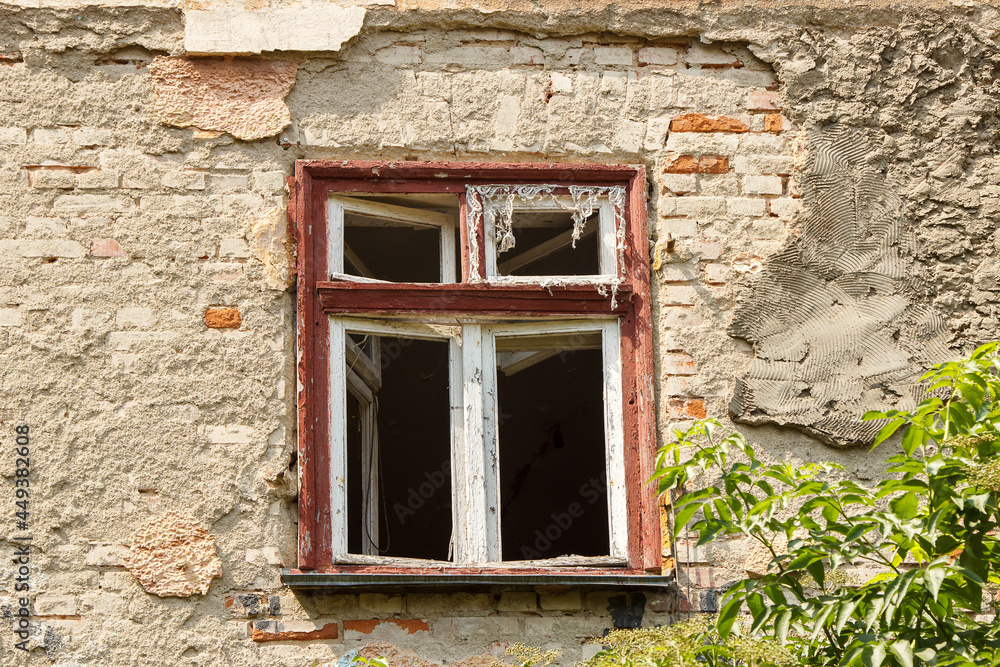 window of old abandoned house in the city window of old abandoned house in the city