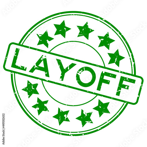 Grunge green layoff word with star icon round rubber seal stamp on white background