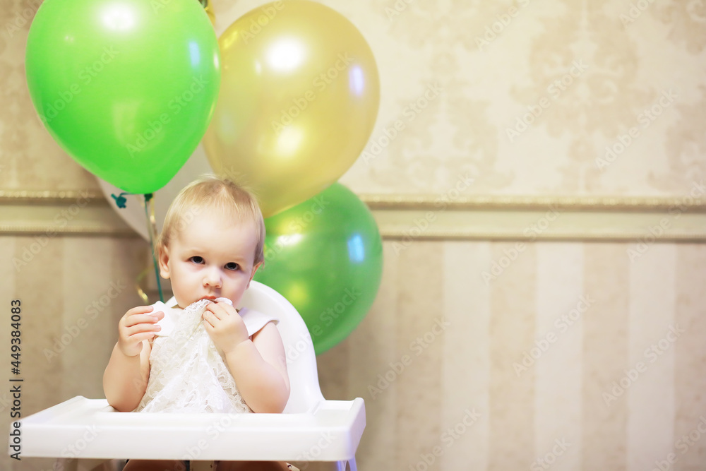 Birthday one year old girl with baloons