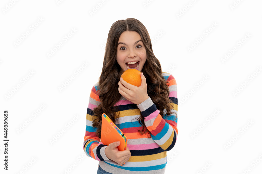 just one bite. knowledge. happy kid girl with orange and school notebook. vitamin and dieting just one bite. knowledge. happy kid girl with orange and school notebook. vitamin and dieting