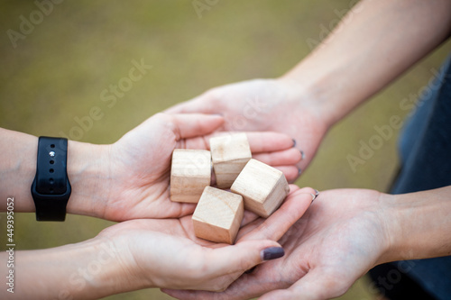 Wooden block in hands